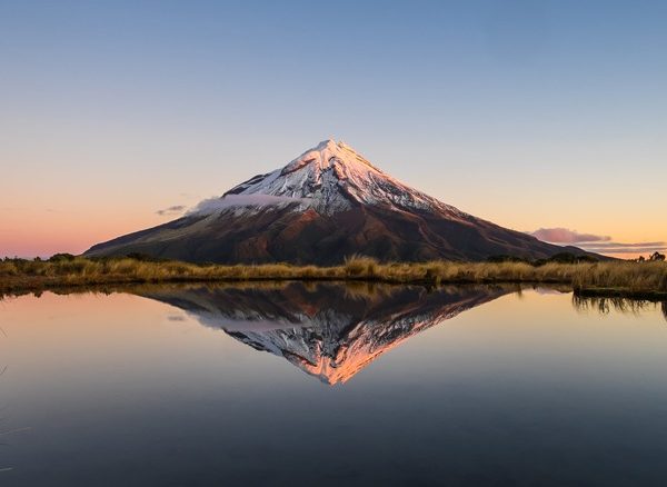 Majestic view of Mount Kilimanjaro with its snow-capped peak and towering presence.